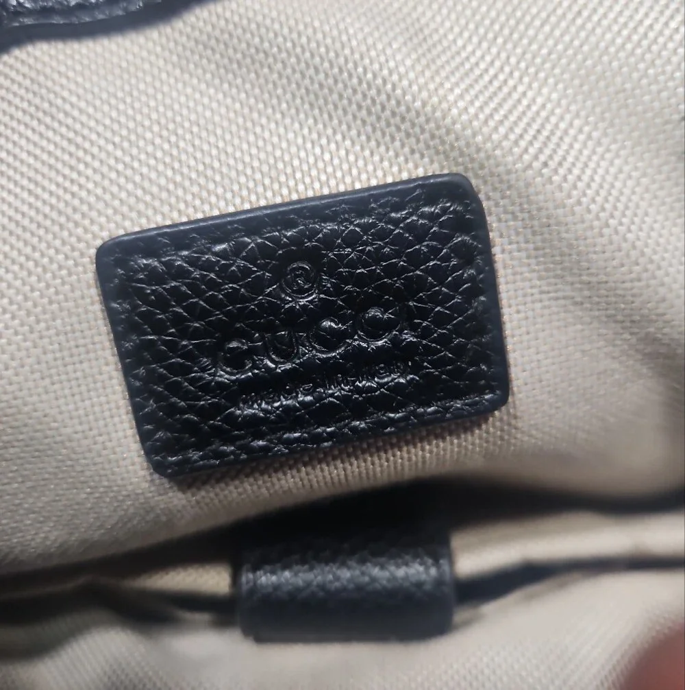 Gucci Black Embossed GG Leather Drawstring Backpack